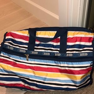 LeSportSac striped rainbow overnight bag